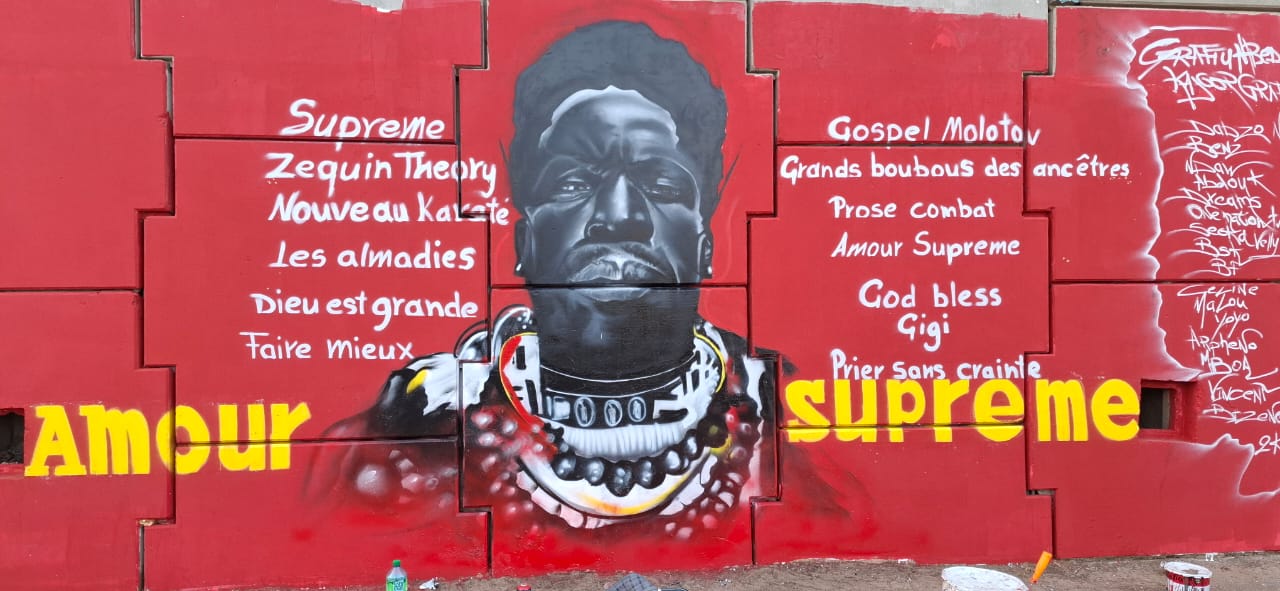 Fresque murale : Kheucha04 rend hommage à Youssoupha dans les rues de Dakar